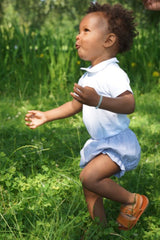 blue baby bloomers and white collar bodysuit